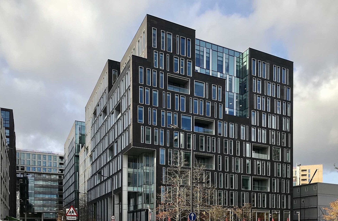 A black midrise building in King’s Cross, London